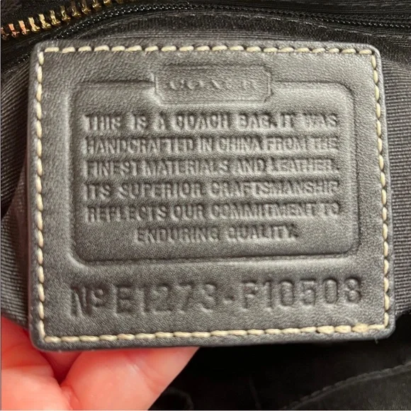 Coach Black Signature Shoulder Bag with Gold Accents